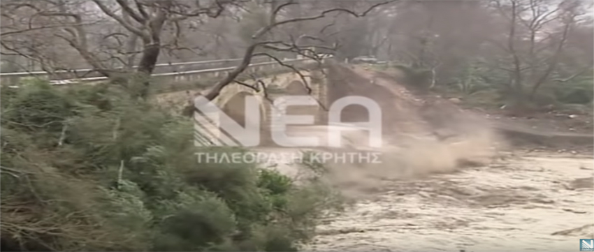 Watch historic arch bridge collapse under the force of floodwaters in Crete image