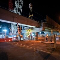 31m concrete beams installed overnight to convert level crossing to bridge image