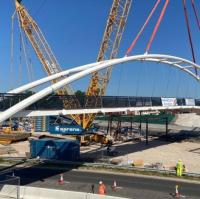 Arch bridge lifted into place over Derbyshire road image