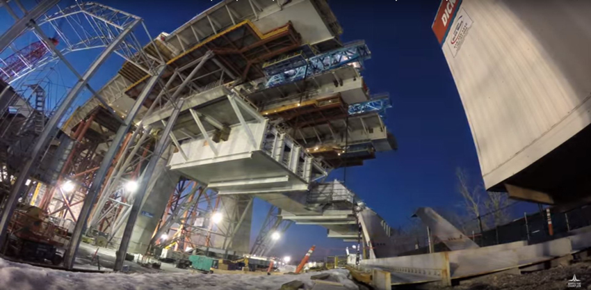 Installation of the first main-span segment of Canada’s New Champlain Bridge logo 