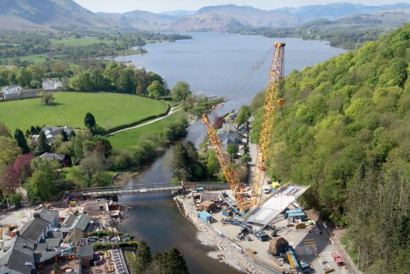 UK's first stainless steel bridge lifted into place logo 
