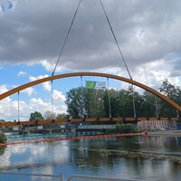 UK bowstring arch bridge installed logo 