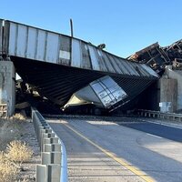 Lorry driver dies in bridge collapse as freight train derails logo 