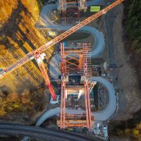Germany: concrete pour complete on 65m high bridge logo 