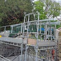 Restored cast-iron UK bridge put back at greater height logo 