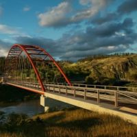 Massive crawler crane lifts New Zealand arch bridge logo 