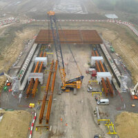 Assembly begins on UK green rail bridge logo 