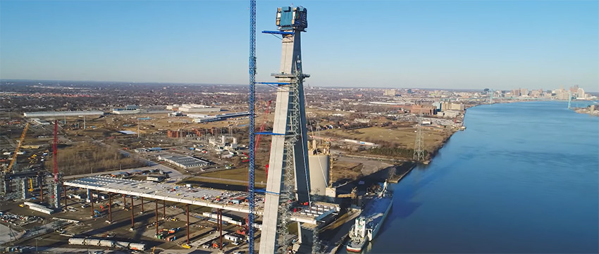 Flyover of the under-construction Gordie Howe Bridge  logo 